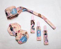 Set of Princess feeding tube accessories - 44" cord keeper, 3 clips, and 2 button cushions