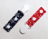 Set of Two Snowflakes Tubie Clips, Cord Clips. Ready to Ship. Blue and Red.