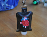 Anatomical Heart Keychain Hand Sanitizer Holder.